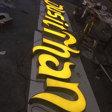 不锈钢钢结构楼体广告牌匾标识一体化解决方案 从设计制作到安全检测的全流程解析